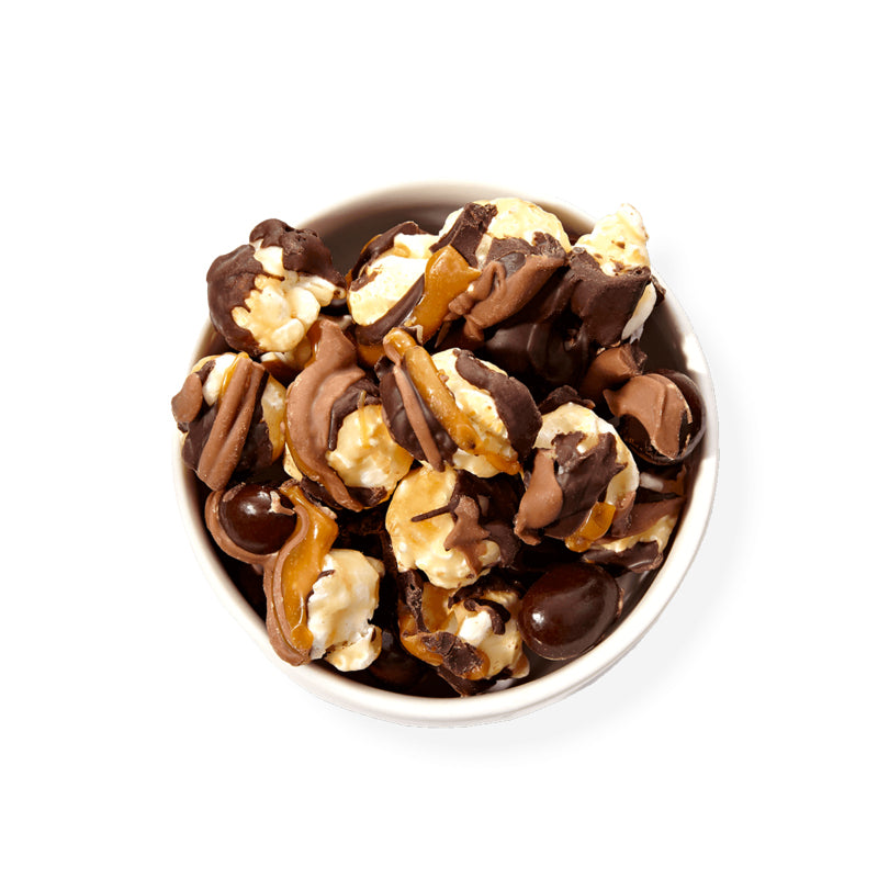 Dark Chocolate Mocha-td {border: 1px solid #ccc;}br {mso-data-placement:same-cell;} We drew inspiration from a local coffee shop to create this mocha popcorn confection that tastes just like your favorite mocha drink. We start with our decadent, buttery caramel corn, add dark and milk chocolatey mocha goodness, chewy caramel, and then top it all off with a sprinkle of dark chocolate covered espresso beans.-Funky Chunky